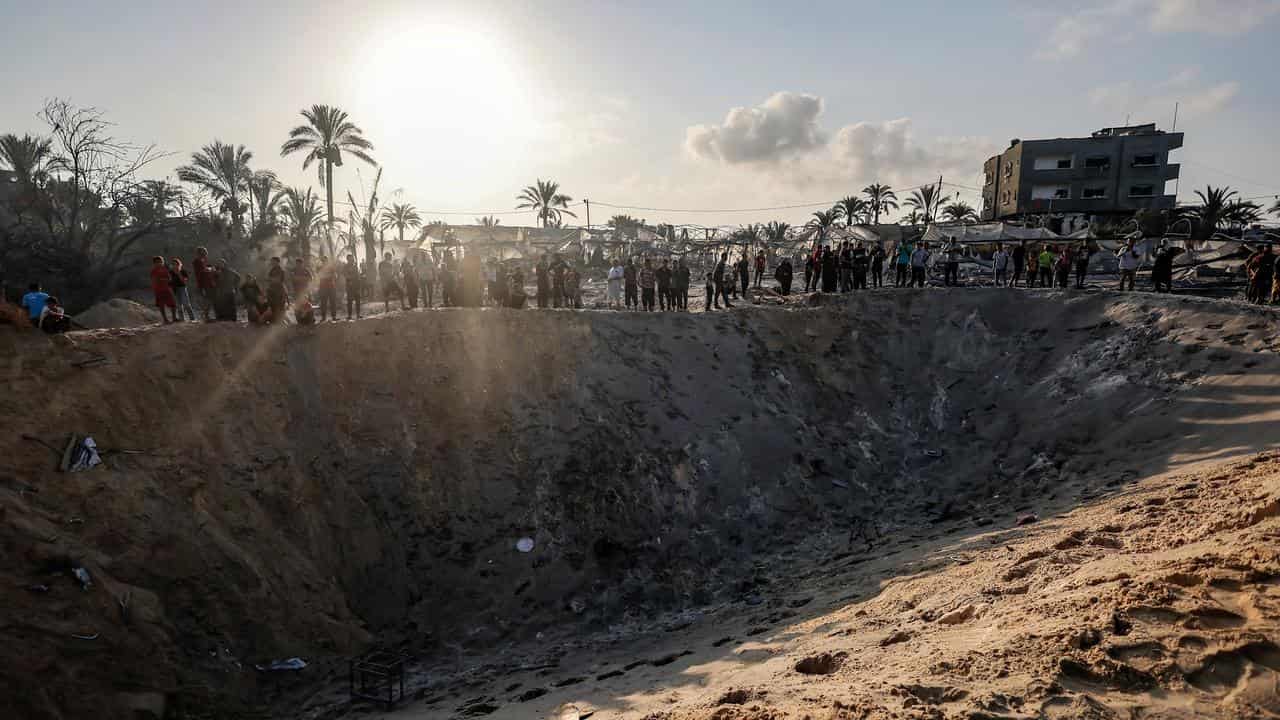 Search for missing people after Israeli air strikes at Al-Mawasi