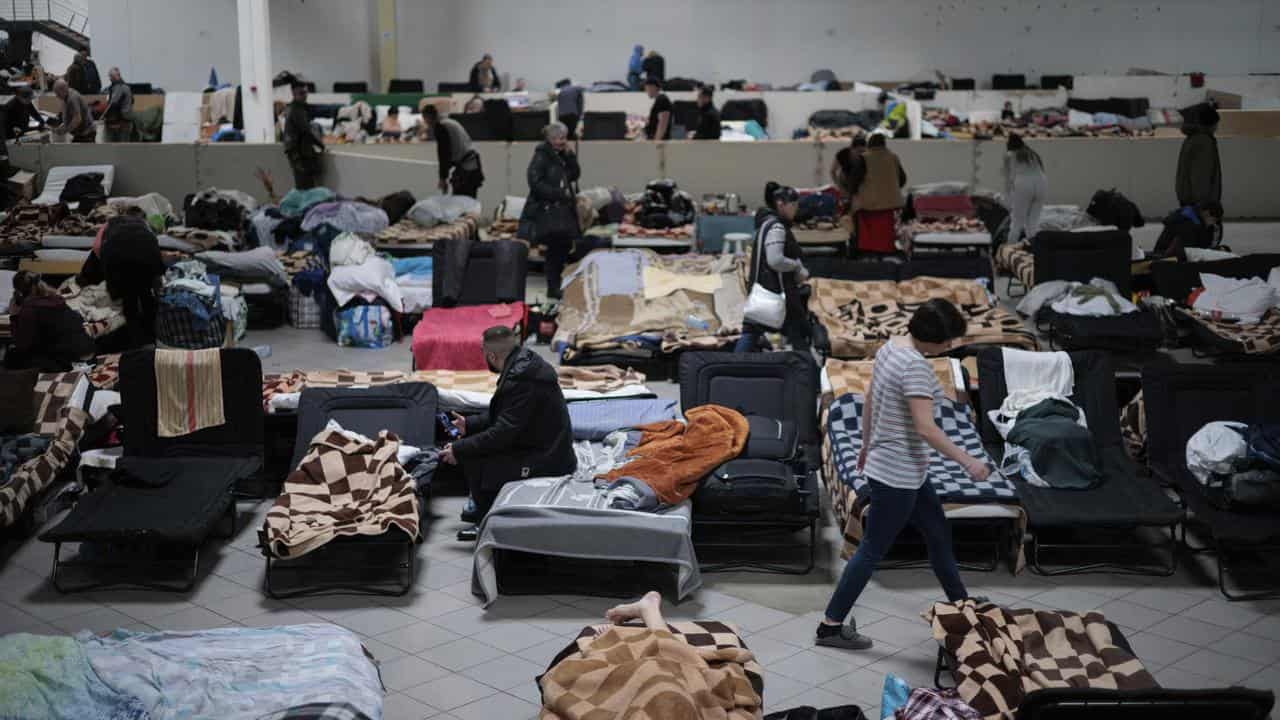 Ukrainian refugees rest at a refugee center in Nadarzyn, near Warsaw