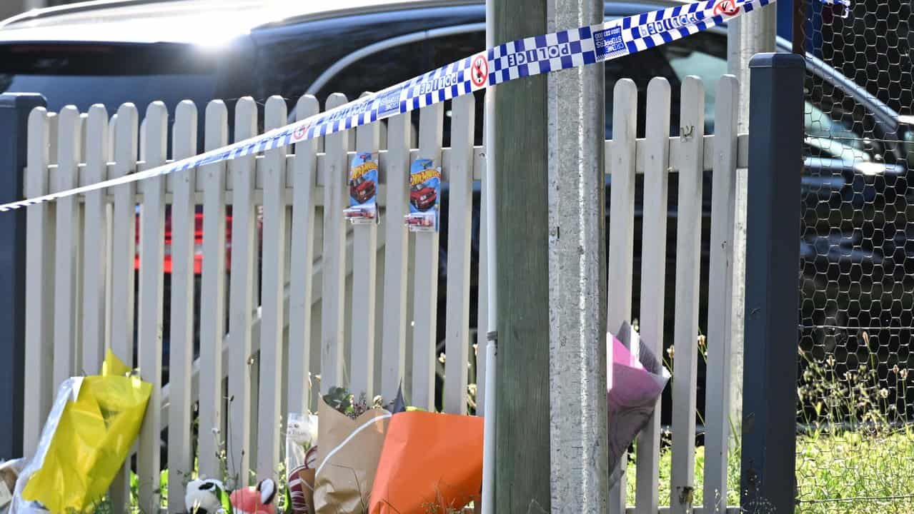 Tributes at the scene of a Blue Mountains double homicide