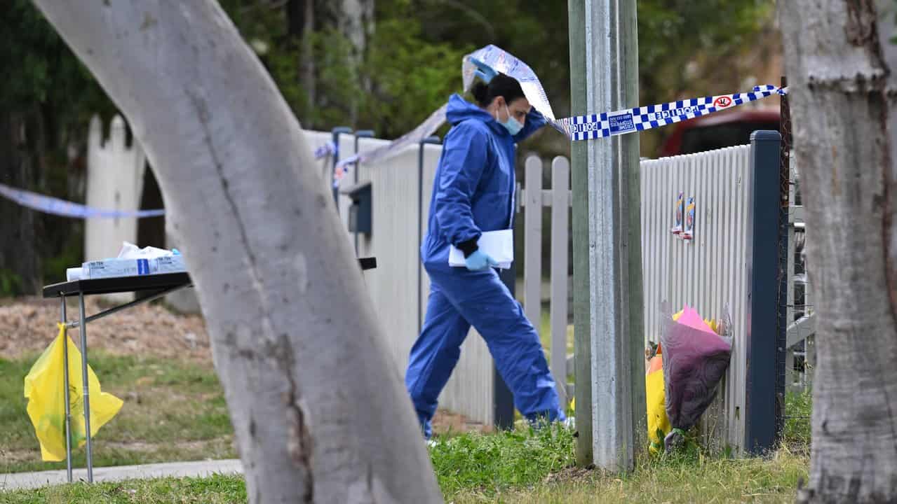 police forensic officers continue to work the scene