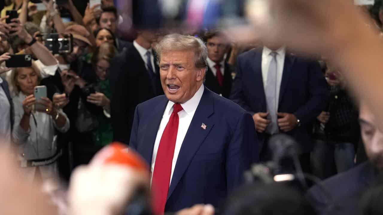 Donald Trump speaks to reporters after the debate in Philadelphia