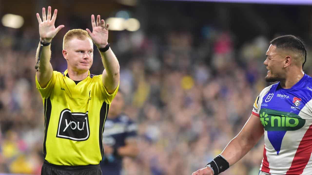 Referee Todd Smith and Leo Thompson.