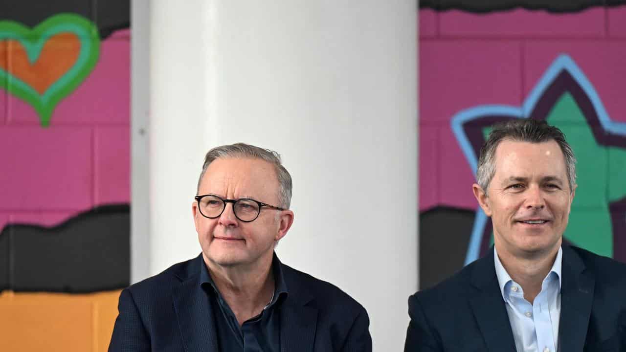 Anthony Albanese and Jason Clare at a school assembly.