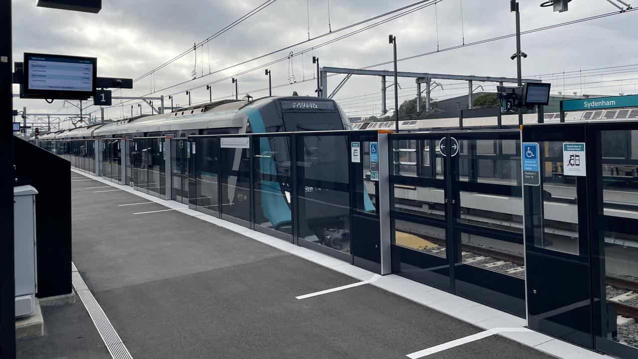 The Sydney Metro City line is seen stopping at Sydenham station