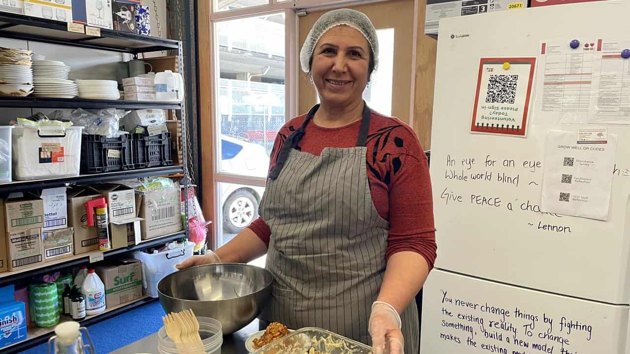 Faiza Somo in the Think + Do  Tank community house kitchen.