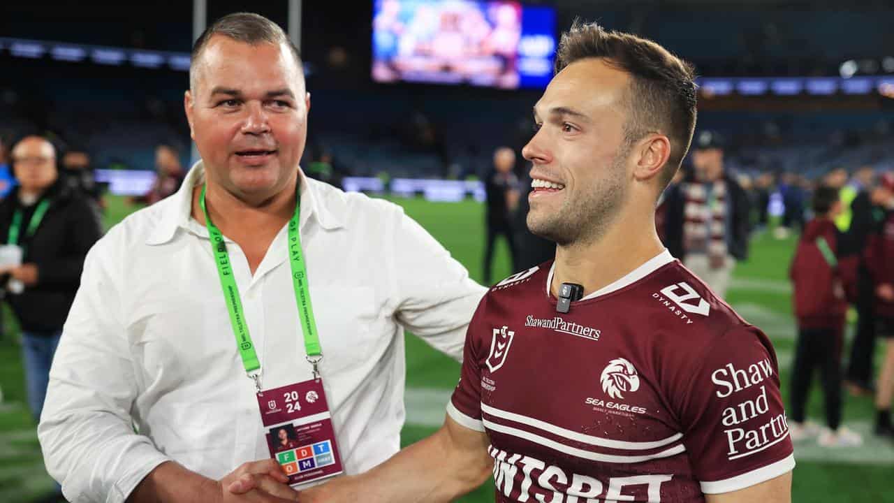 Anthony Seibold congratulates Luke Brooks.