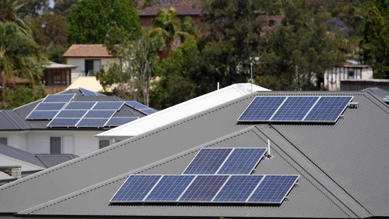 Solar panels on the rooftops of houses (file image)