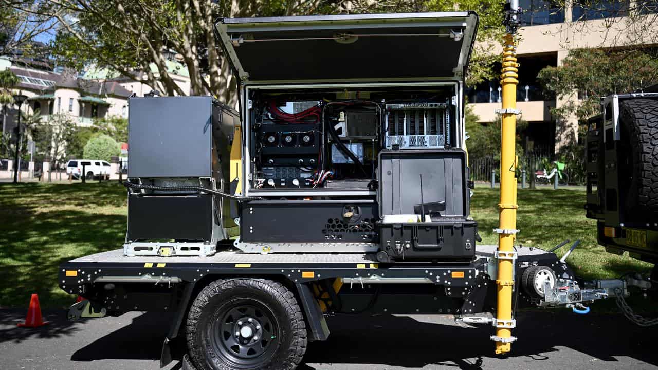 Cell on Wheels operators outside NSW Parliament