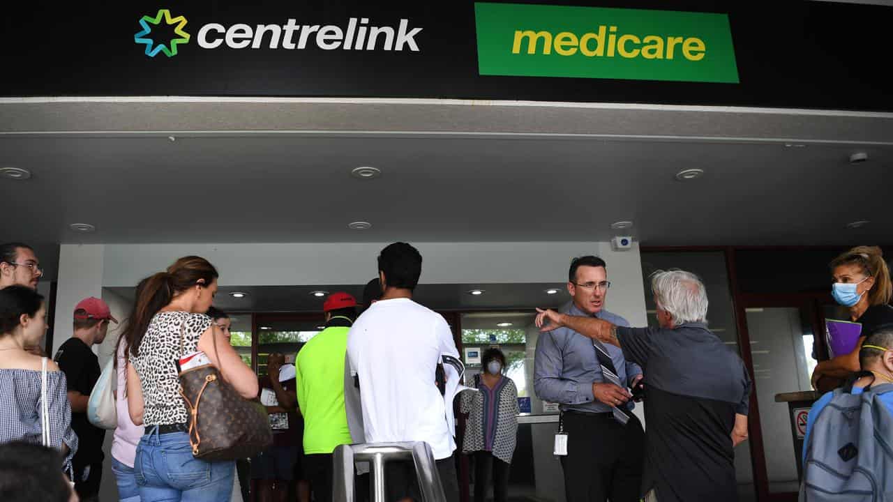 People queueing outside Centrelink in Southport on the Gold Coast