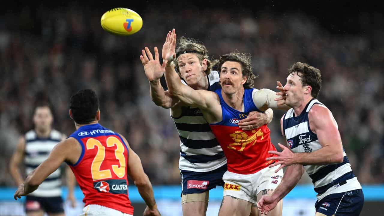 Joe Daniher (second right).