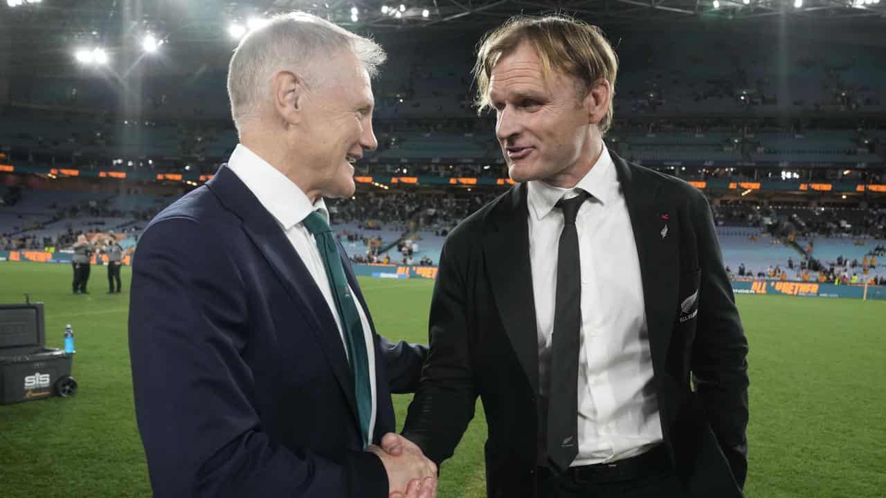 Joe Schmidt and Scott Robertson.