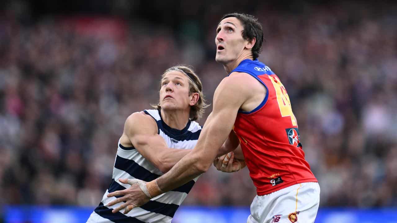 Geelong's Rhys Stanley (l) and Oscar McInerney of the Lions