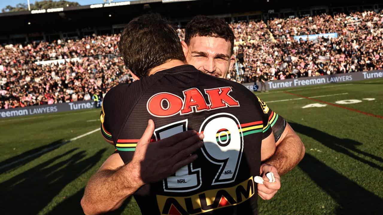 Nathan Cleary hugs Mavrik Geyer.