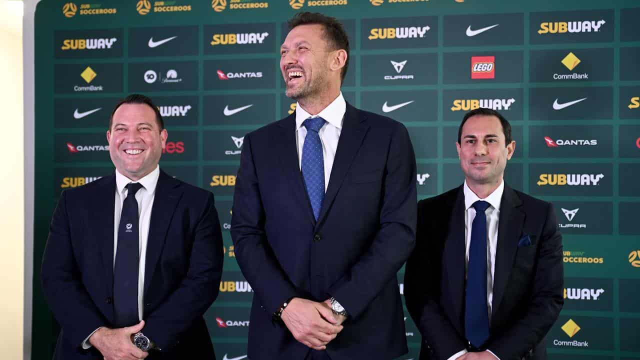 James Johnson (left), Tony Popovic and FA chair Anter Isaac.