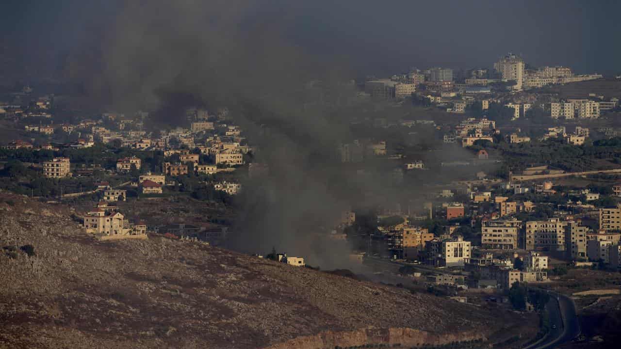 Smoke rises from an Israeli air strike on Kfar Rouman village, Lebanon