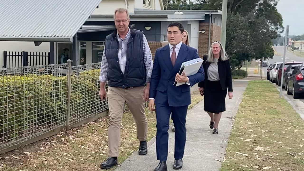 Peter Smith (centre) with his defence lawyer Bryan Wrench (right)