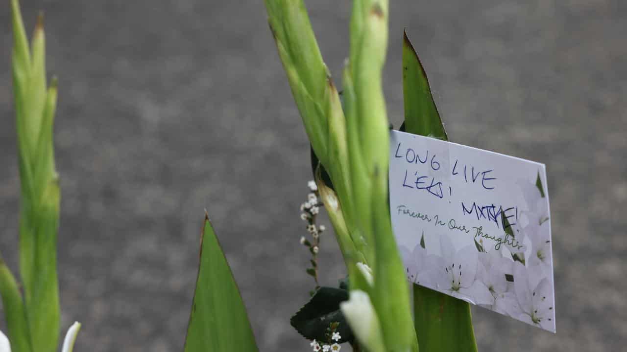 A floral tribute at the scene of the stabbing 