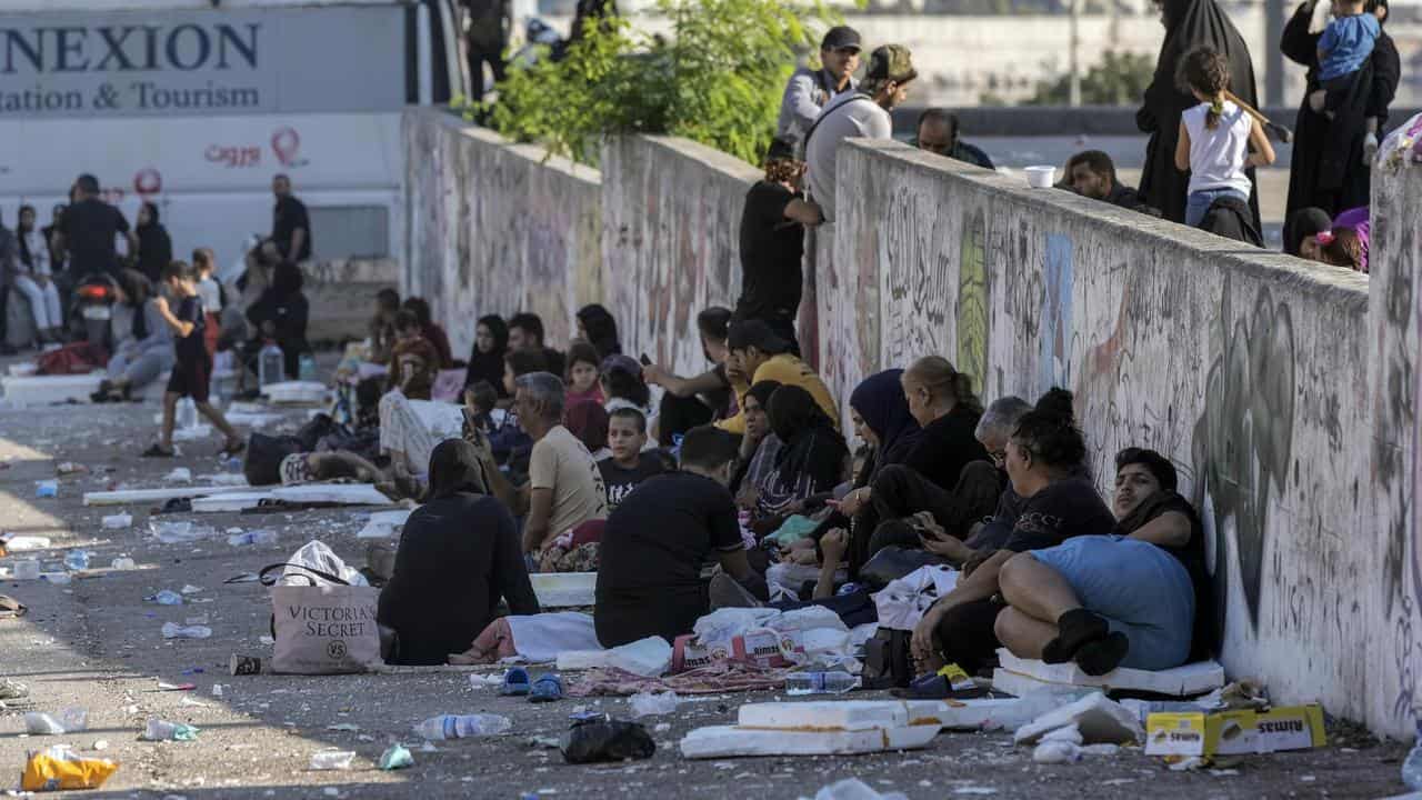 People site on the ground in Lebanon