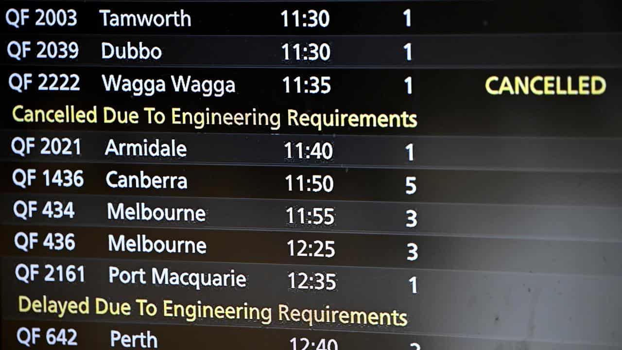 A fights information board showing cancelled flights