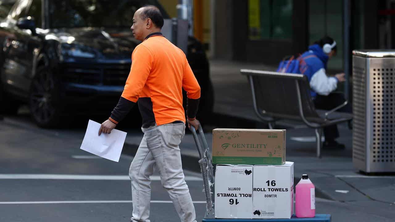 A worker delivering goods in Melbourne