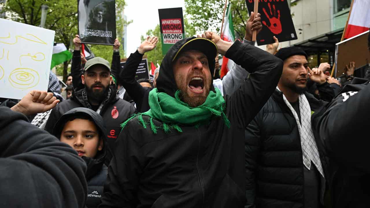 Protesters march during a Pro-Palestine rally for Gaza and Lebanon