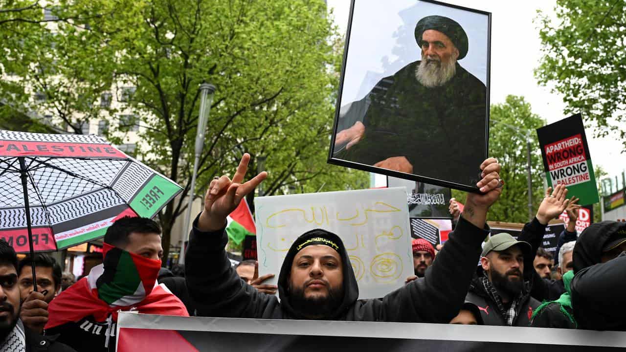 Protesters march during a Pro-Palestine rally for Gaza and Lebanon