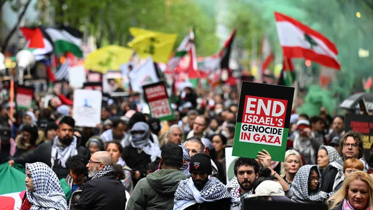 Protesters march during a Pro-Palestine rally for Gaza and Lebanon