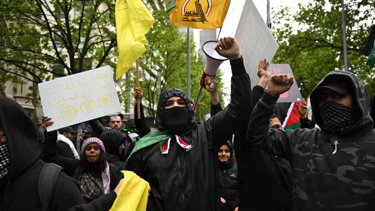 Protesters march during a Pro-Palestine rally for Gaza and Lebanon