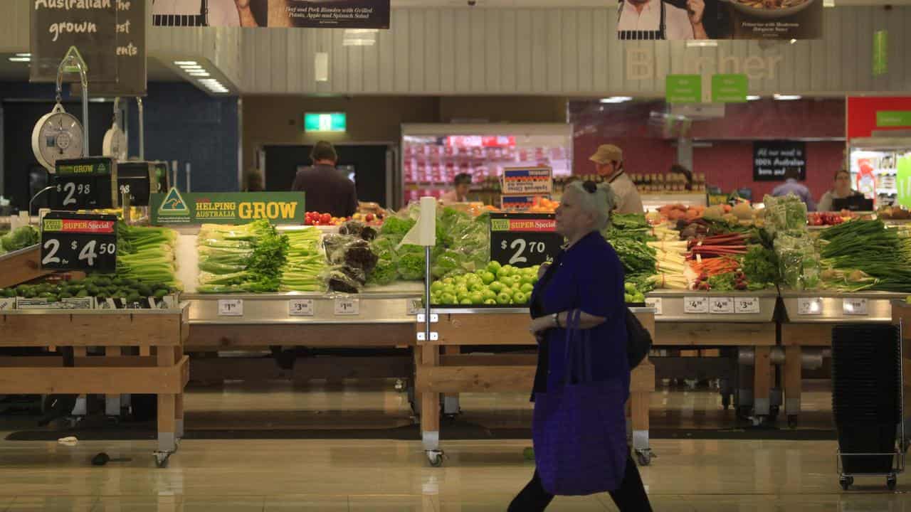 Shoppers at a Coles supermarket