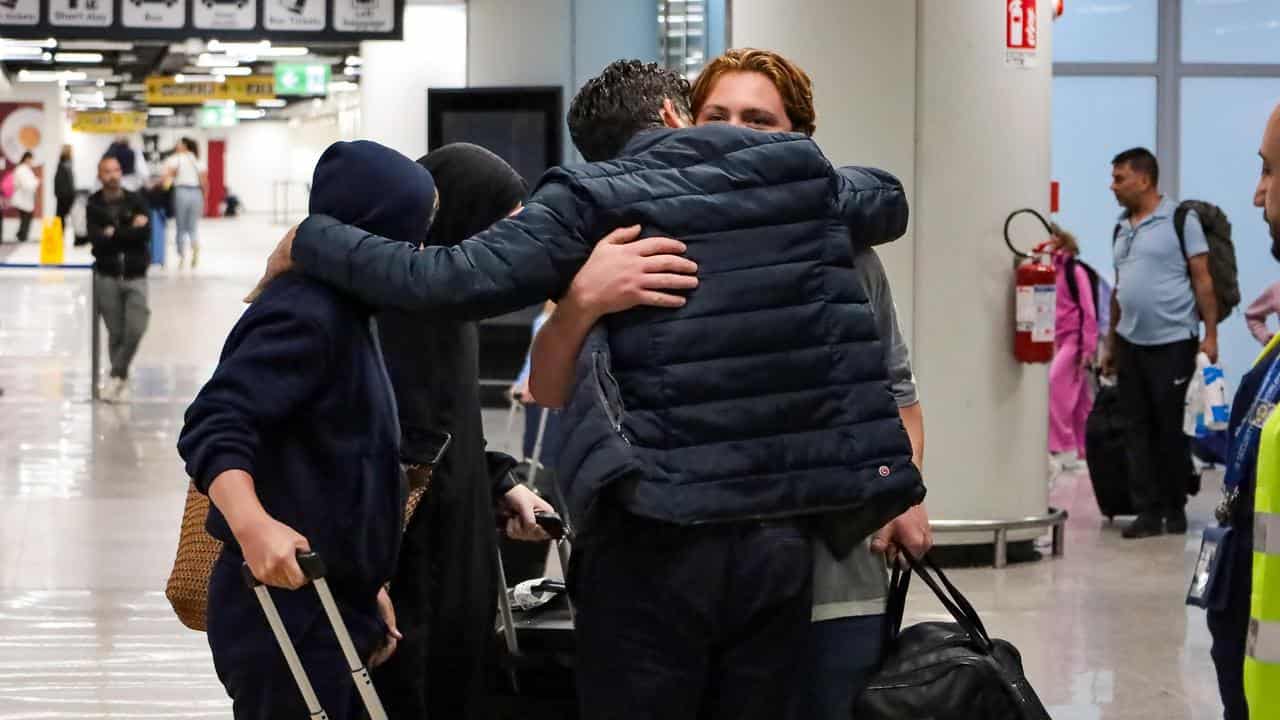 Passengers arrive in Italy on a charter flight from Beirut