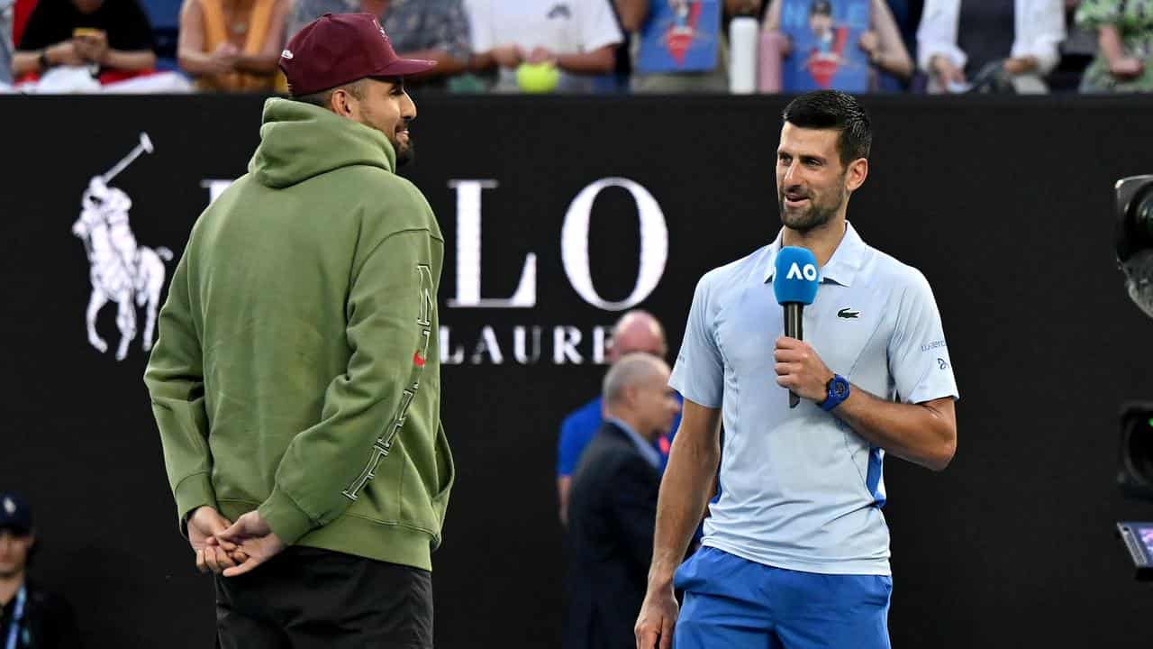 KNick Kyrgios with Novak Djokovic.