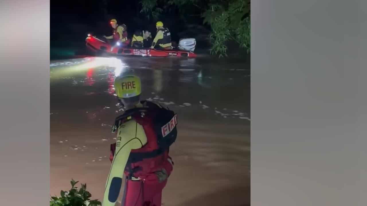 Queensland Fire and Rescue rescuing five people