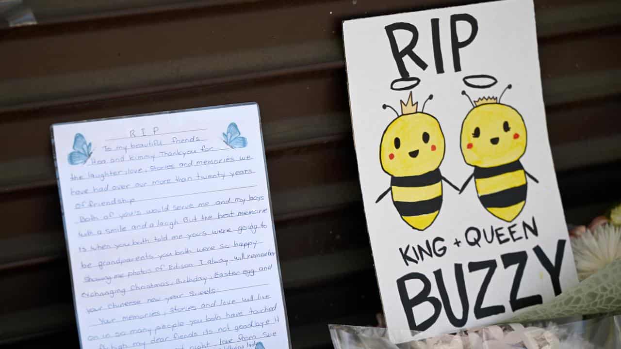 Tributes outside Buzzy Bee's in Cambridge Park