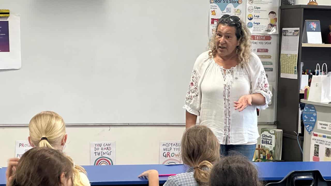 Minnie King speaking to students in western Cape York