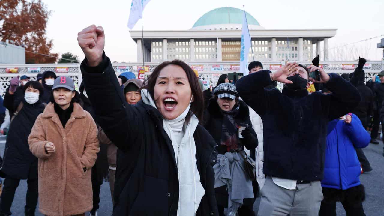 Protesters outside the National Assembly in Seoul, South Korea