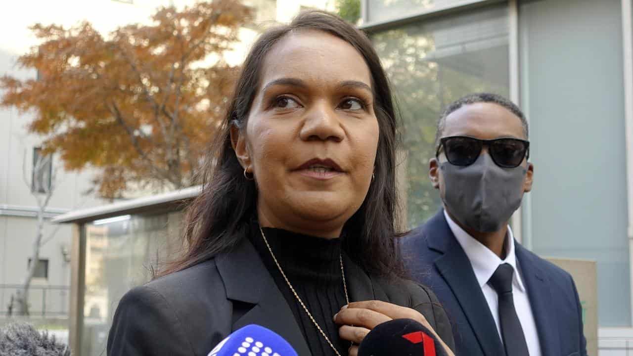 Kristal Hilaire, a daughter of Donna Nelson, outside court in Japan