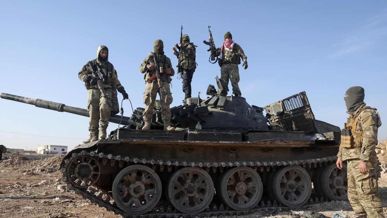 Syrian opposition fighters on the outskirts of Hama, Syria