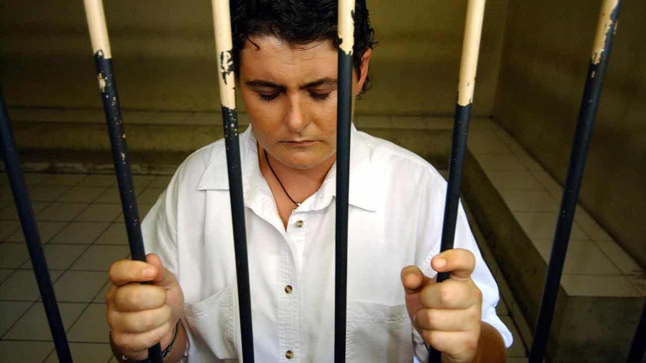 Renae Lawrence waits in a holding cell