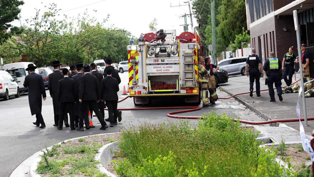 Police and fire crew at a fire at the Adass Israel Synagogue