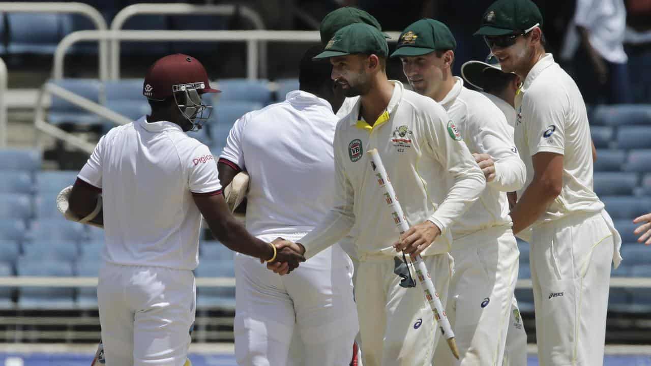 Veerasammy Permaul and Nathan Lyon.