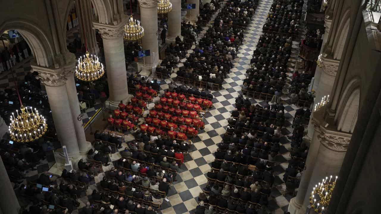 Guest attend the service in Notre Dame Cathedral