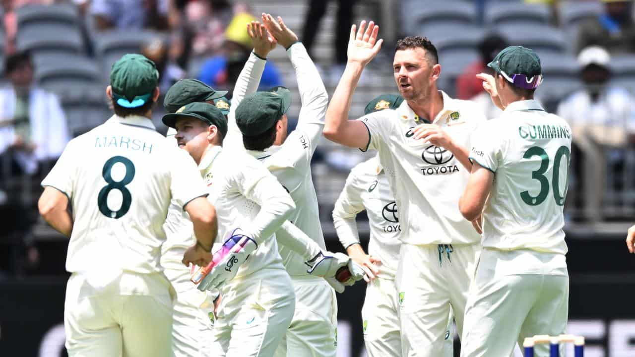 Josh Hazlewood (second right).