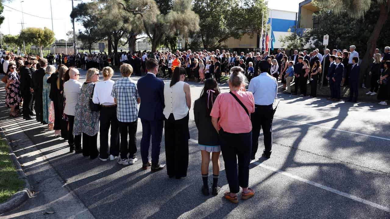 Guests line the road