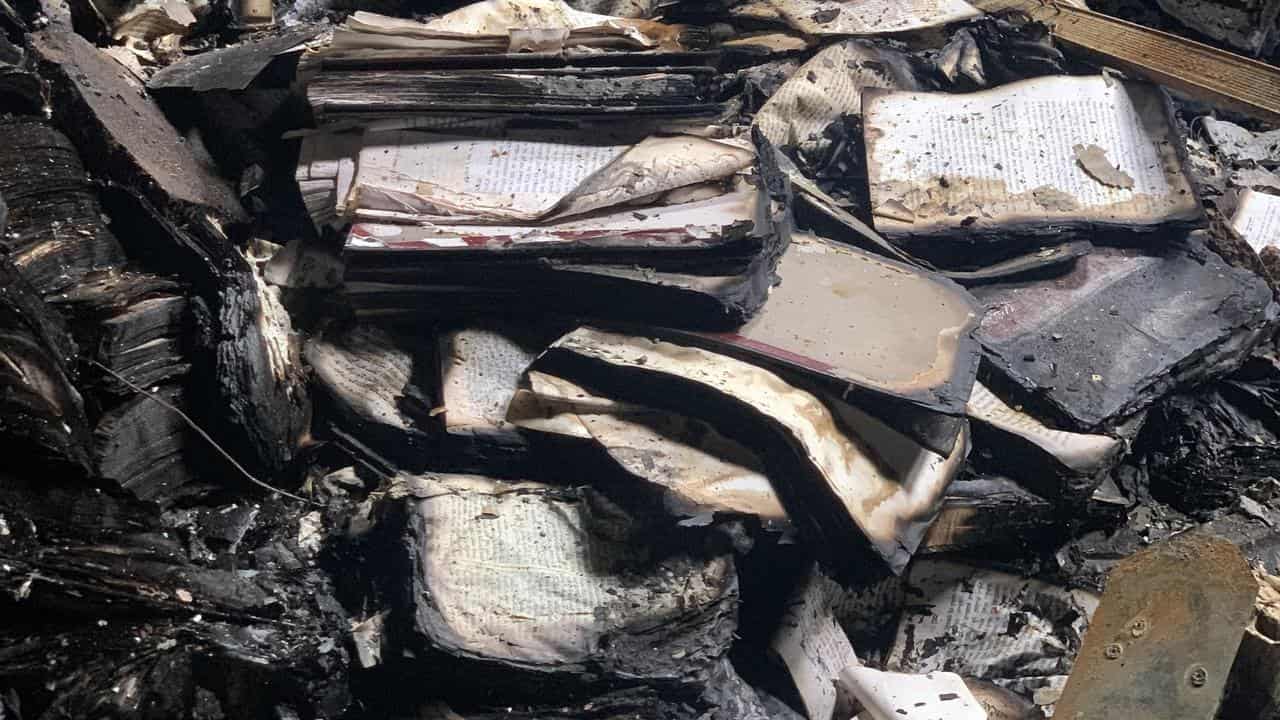 Burned books after a firebombing at the Adass Israel Synagogue.