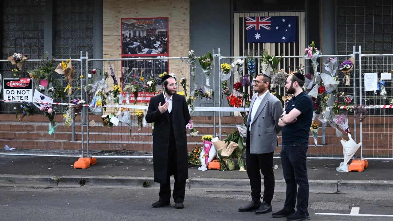 Rabbi Gabi Kaltmann (centre) at the Adass Israel Synagogue.