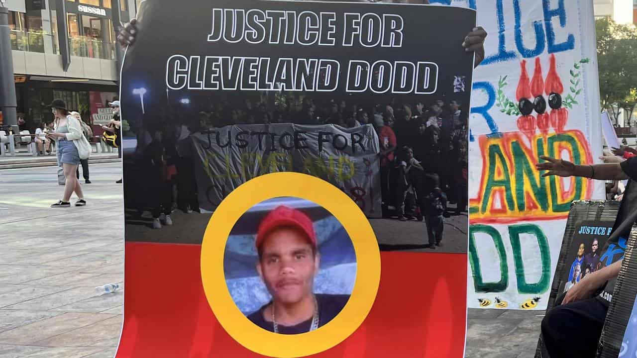 Placard showing Cleveland Dodd's image (file)