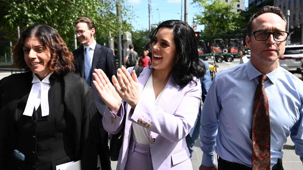 Independent MP Moira Deeming (centre) 