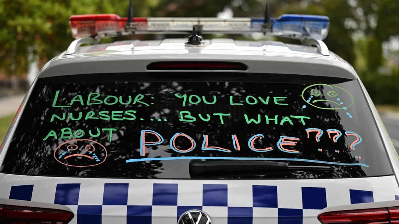 Political statements on the side of a Victoria Police car