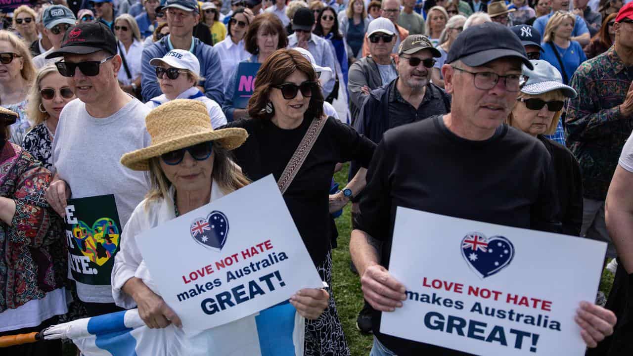 Jewish community supporters gather at a rally