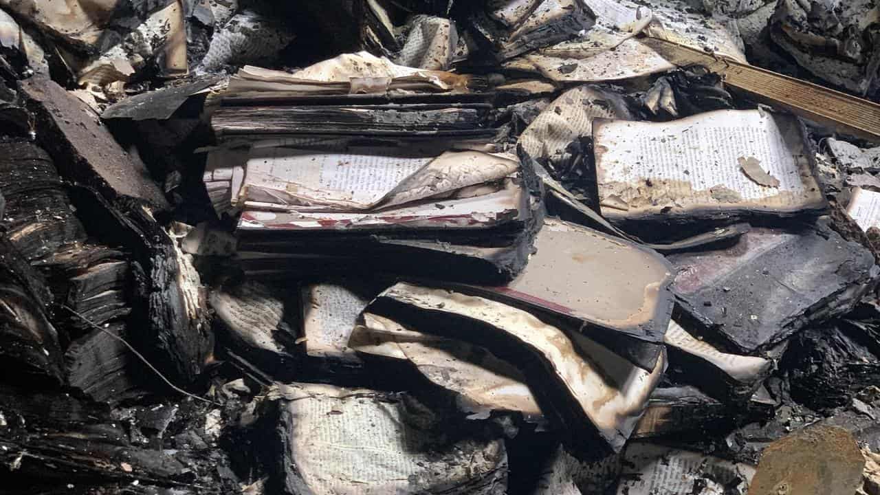 Burned books and papers after Adass Israel Synagogue firebombing 